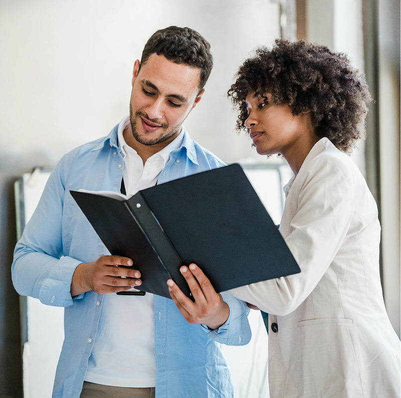 An entrepreneur receiving guidance from a mentor as part of a business support programme within the South African Founder Network.